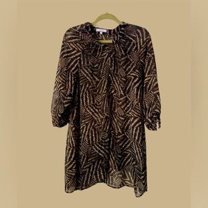 Feather print light weight layering tunic. 9 button front for cami exposure.